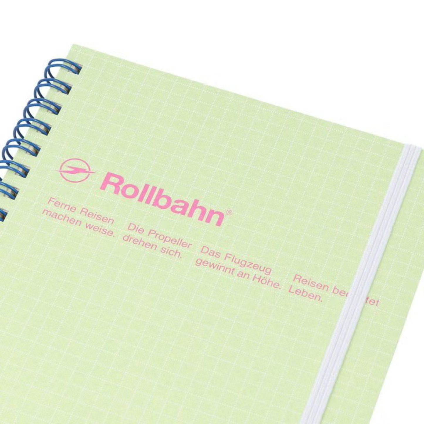 Close up view of the Fathom spiral bound retro notebook in light green with polypropylene cover, metal spiral binding, elastic closure, and 140 perforated cream pages, large Japanese-made stationery.