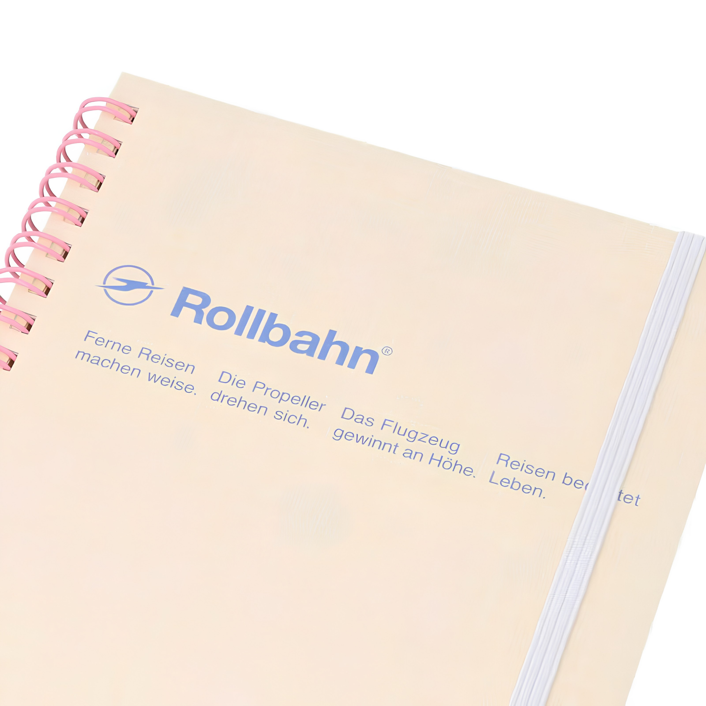 Close up view of the Fathom spiral bound retro notebook in light yellow with polypropylene cover, metal spiral binding, elastic closure, and 140 perforated cream pages, large Japanese-made stationery.