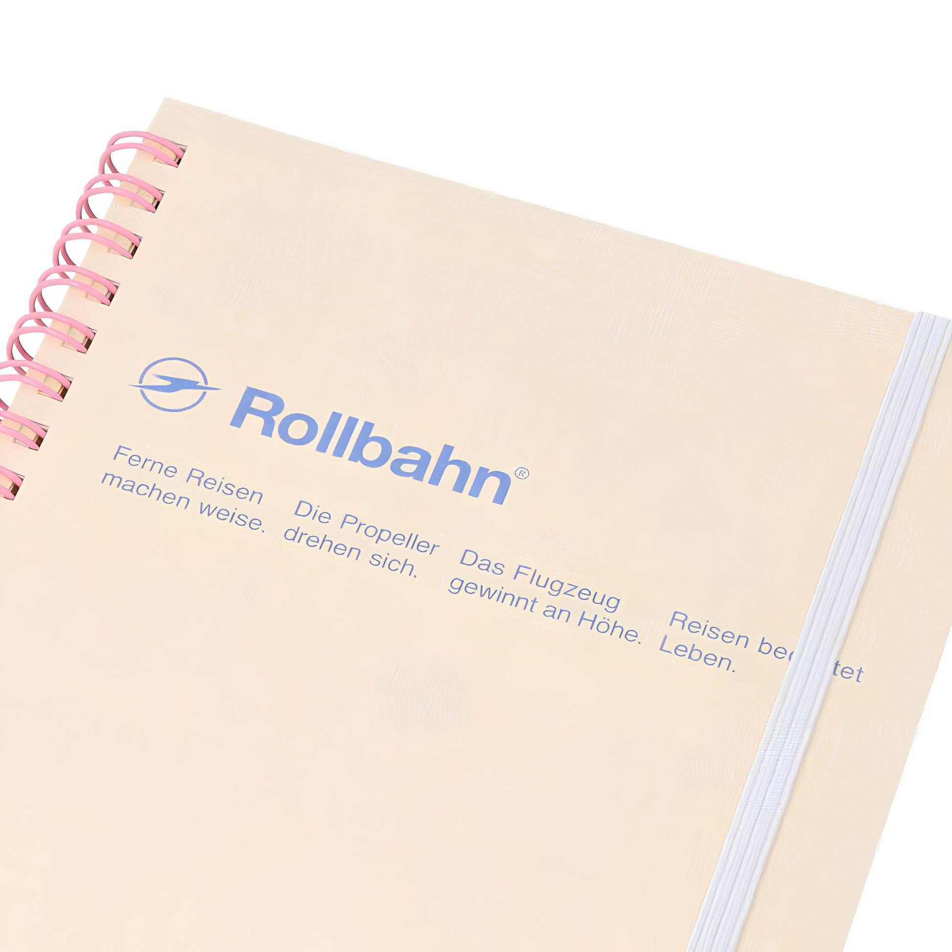 Close up view of the Fathom spiral bound retro notebook in light yellow with polypropylene cover, metal spiral binding, elastic closure, and 140 perforated cream pages, large Japanese-made stationery.