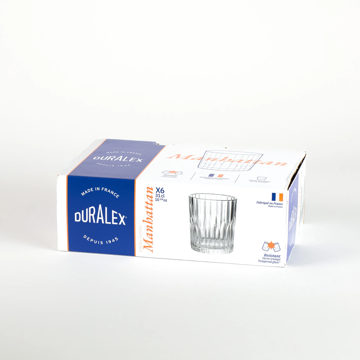 Packaging of Duralex Manhattan Clear Tumbler 310ml Set of 6 in transparent clear, made from impact-resistant tempered glass with an elegant lowball design for serving spirits and classic cocktails.