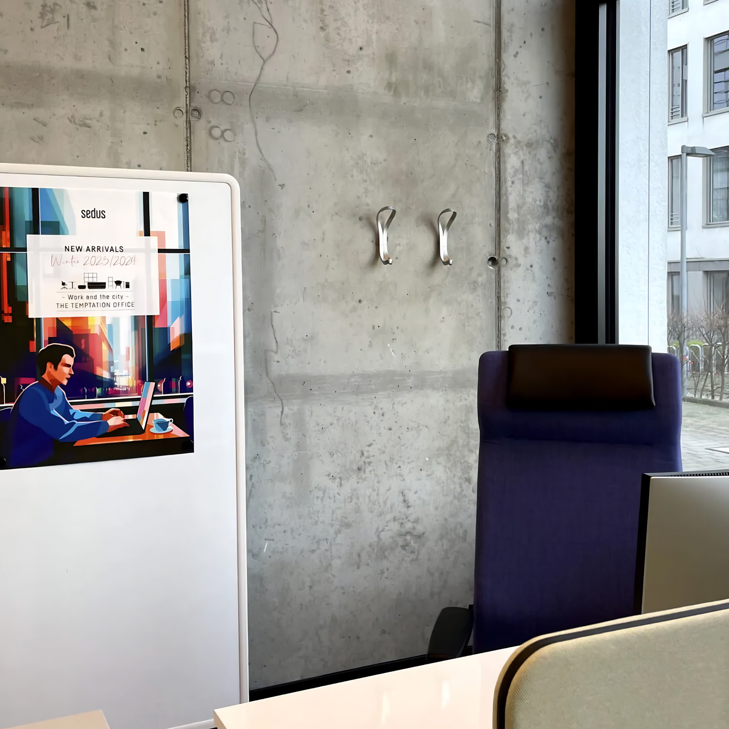 Medium distance shot of two Essem Endless Hook Aluminium designed by Anna von Schewen, from recycled aluminum hung on the wall.