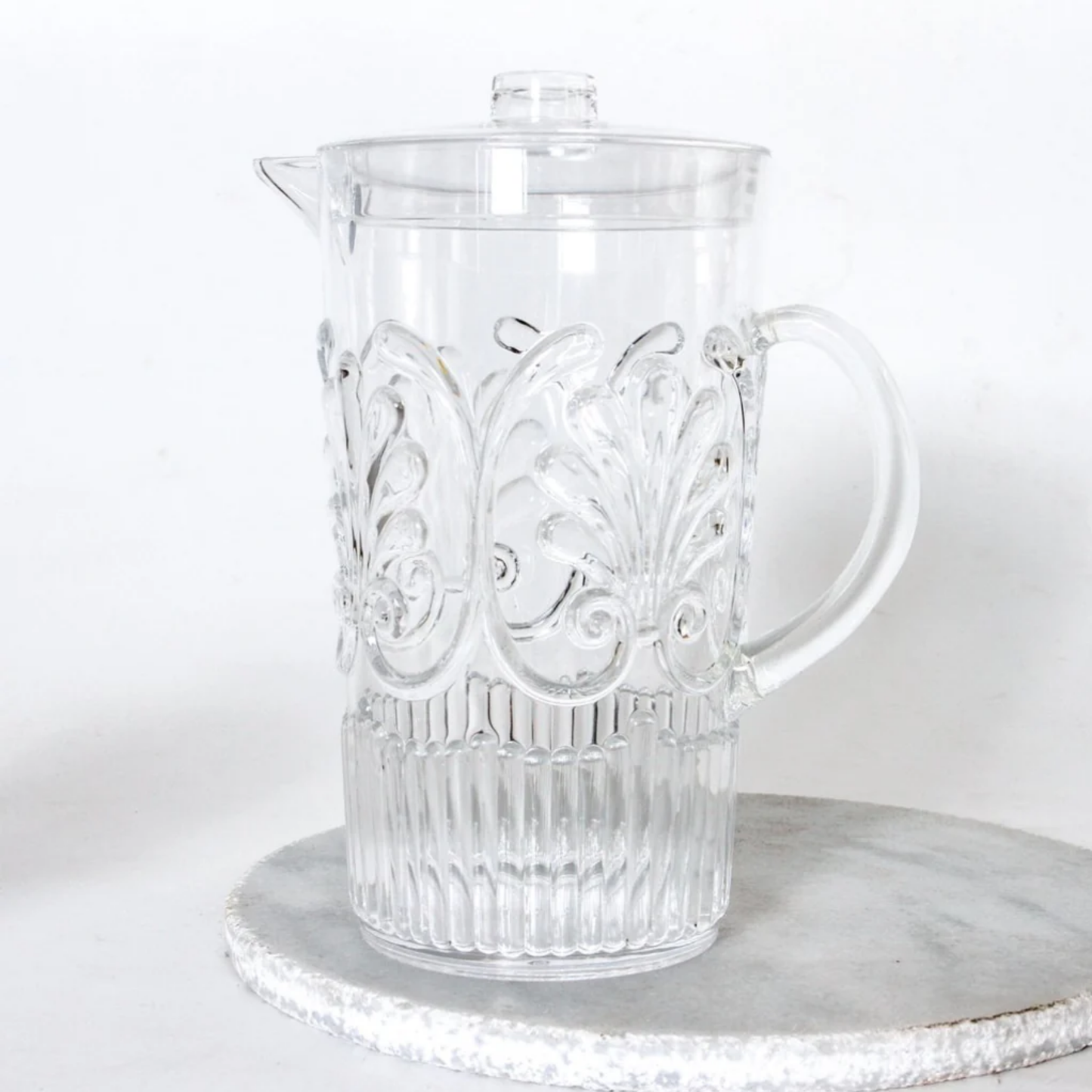 Clear acrylic jug close up side angled view