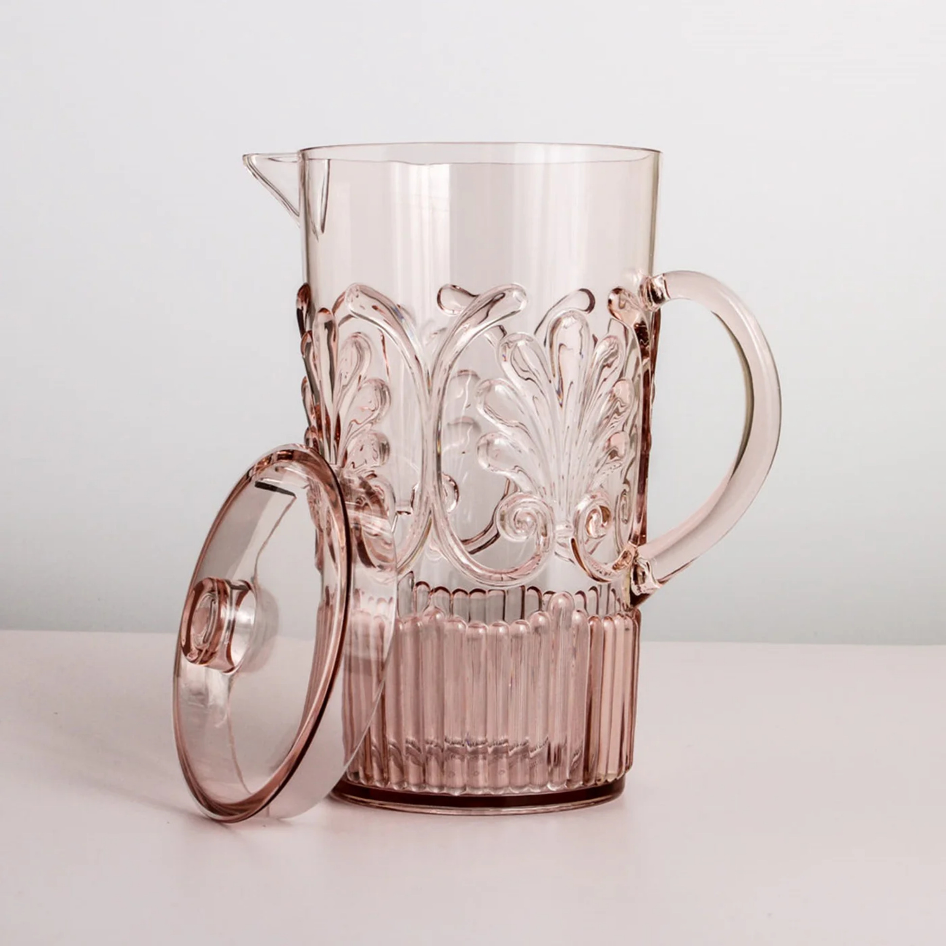 Close up of pale pink acrylic jug pale pink with lid off