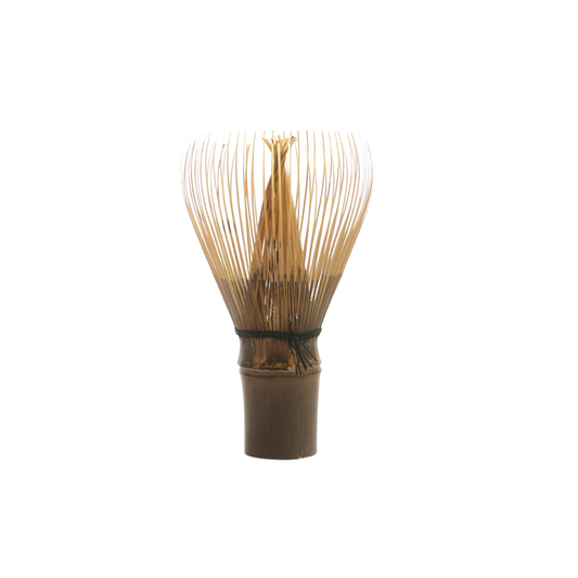 Side view of the Fathom Bamboo Matcha Whisk Dark also known as Chasen, from a single piece of Bamboo in Japan, for preparing matcha.