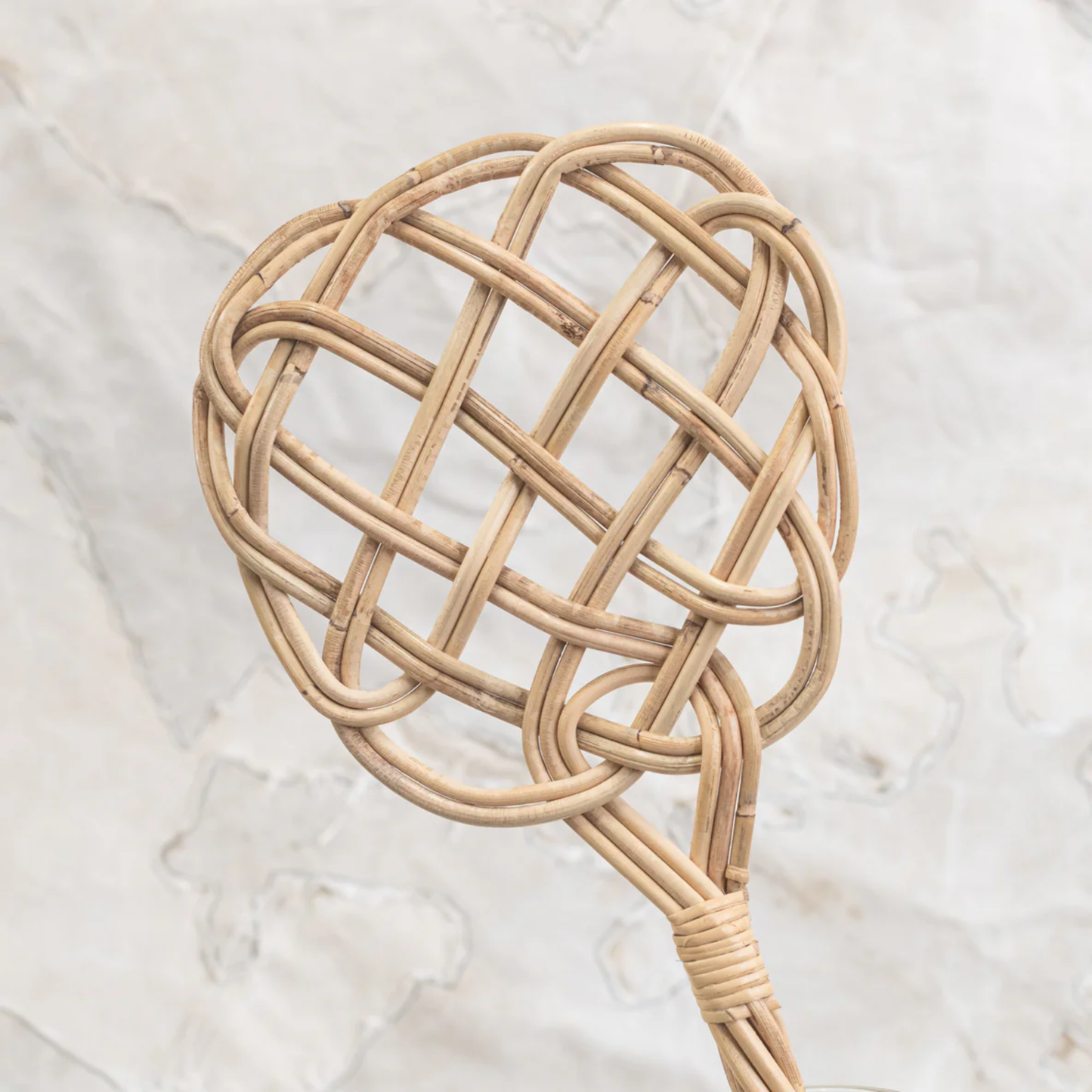 Upclose of the head view of Fathom Carpet Beater - Handwoven rattan reed, 75x23cm, durable and splinter-resistant, traditional dust remover for carpets, rugs, cushions, and pillows, handcrafted German cleaning tool, eco-friendly and long-lasting.