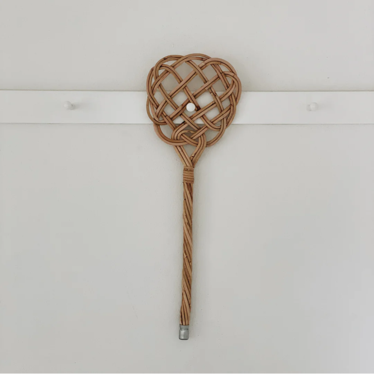 Hung on the wall, Fathom Carpet Beater - Handwoven rattan reed, 75x23cm, durable and splinter-resistant, traditional dust remover for carpets, rugs, cushions, and pillows, handcrafted German cleaning tool, eco-friendly and long-lasting.