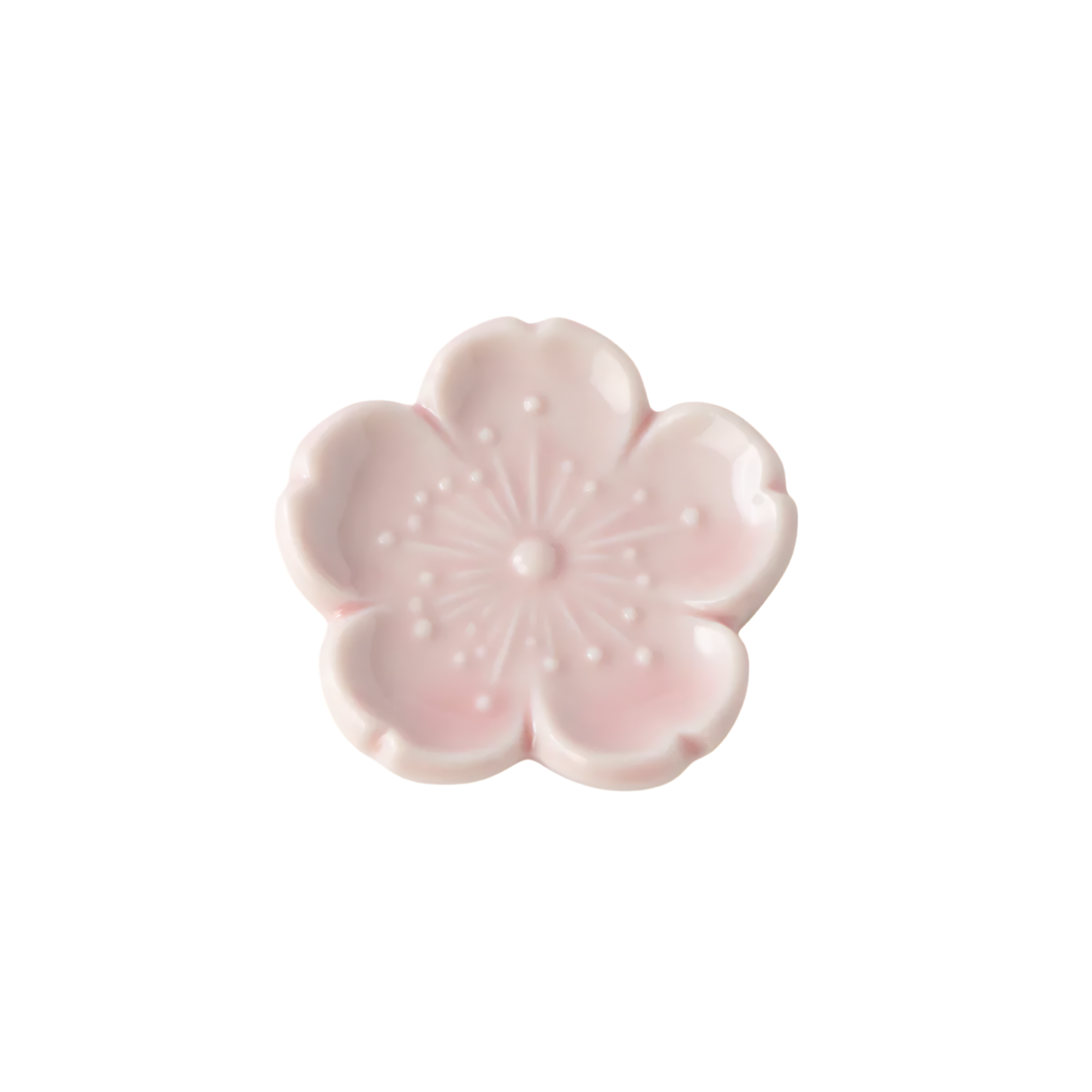 Fathom Chopstick Rest Pink Sakura with soft pink glaze inspired by cherry blossoms and pebble like shape.