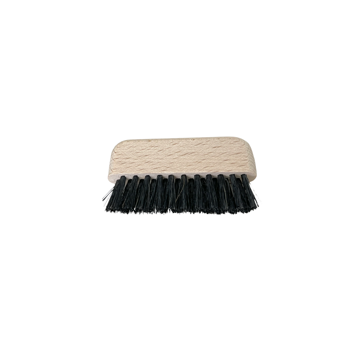 A Fathom Computer Brush featuring a beige handle and stiff black bristles, displayed against a plain white background.