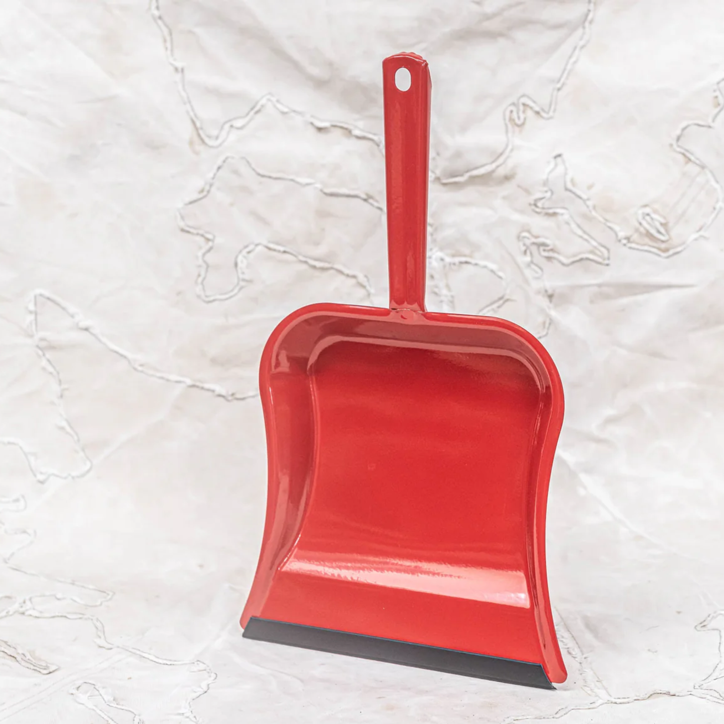 Solo view for Fathom Dustpan Metal Red - German-made solid metal dustpan with rubber edge and hanging hole, 39cm length, 23cm pan, durable and elegant cleaning tool, pairs with natural or vegan dust brushes for effortless sweeping.