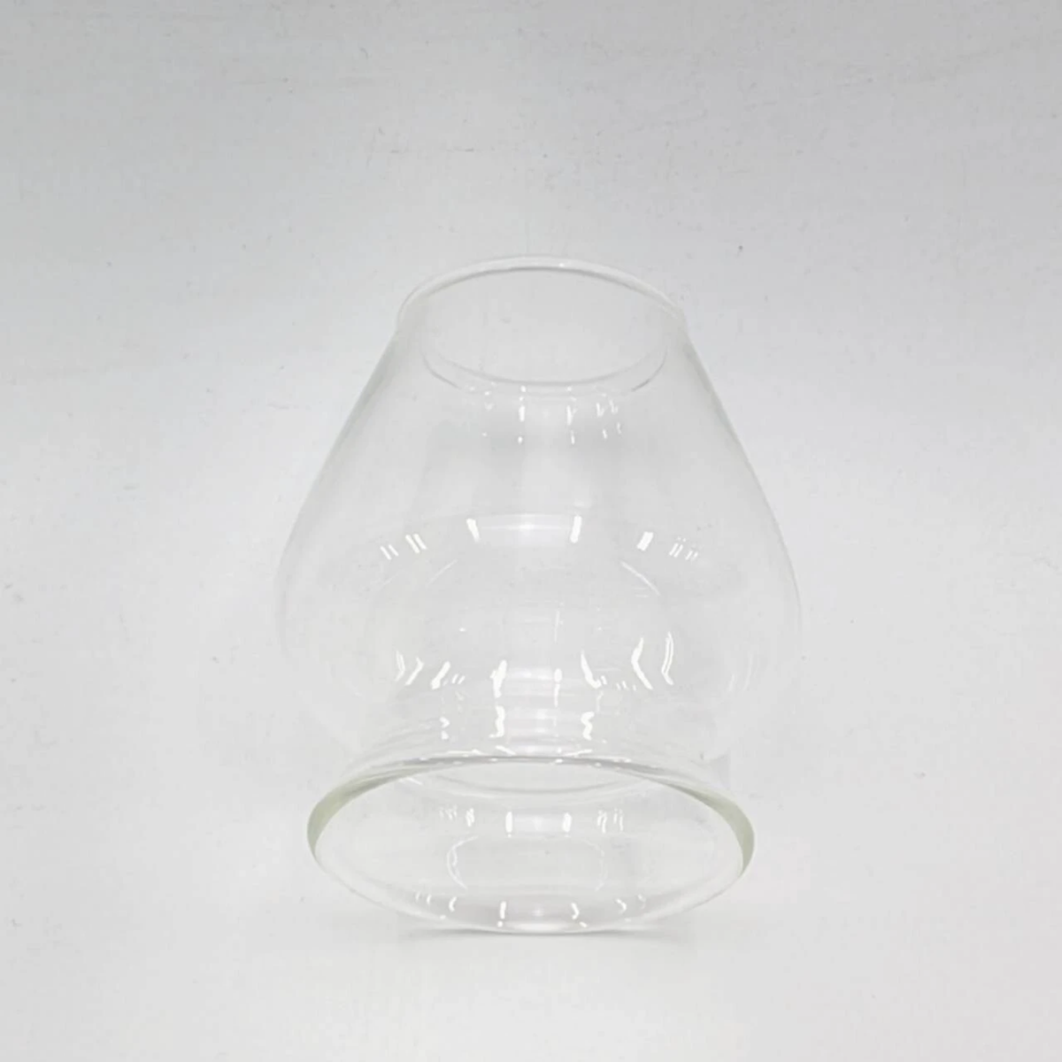 Fathom Japanese Glass Matcha Whisk Stand in clear glass, designed to maintain Chasen shape after washing, shown lying on a surface.
