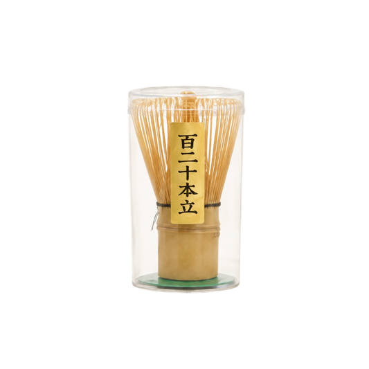 Front view with cover of Fathom Japanese Matcha Whisk 120 Prong White Bamboo in natural ivory, handcrafted from white bamboo with 120 fine prongs for whisking matcha into smooth, creamy foam.