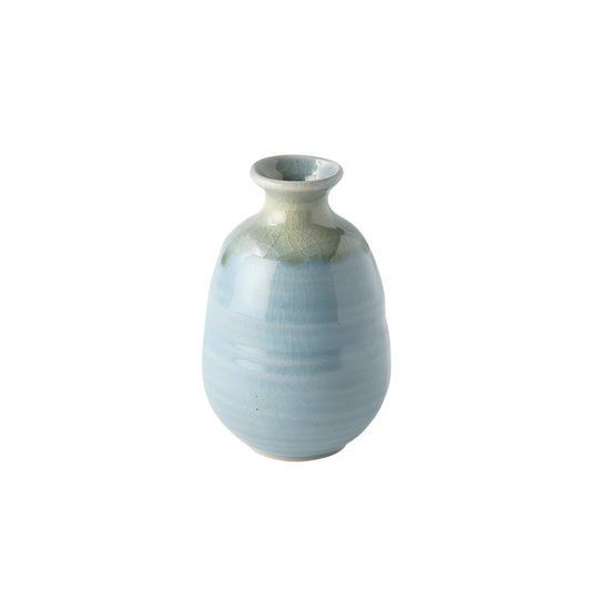 Front view of Fathom Japanese Sake Jug in blue, handcrafted ceramic with crazed glaze, rounded body and narrow neck for smooth pouring warm or chilled sake.
