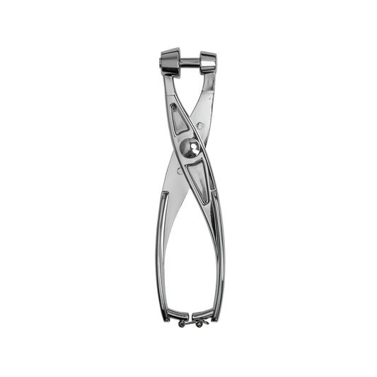 Fathom stainless steel olive and cherry pitter, handheld kitchen tool for safely removing pits from olives and cherries with easy squeeze mechanism.