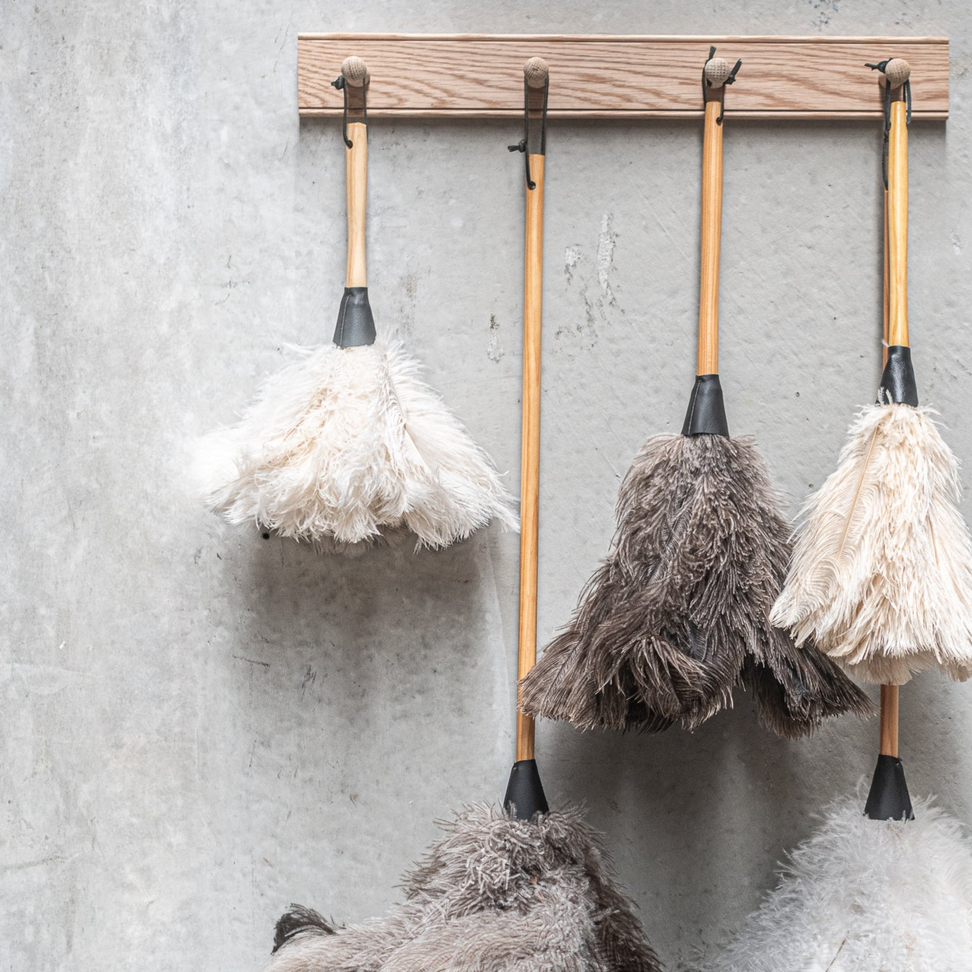 Close up on the Fathom Ostrich Feather Duster 35cm Cream soft natural feather duster for careful and gentle dusting.