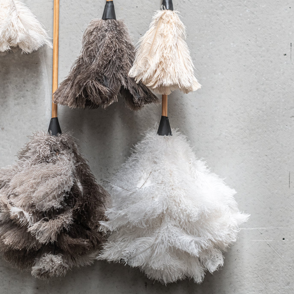 Close up on the Fathom Ostrich Feather Duster 90cm Cream soft natural feather duster for careful and gentle dusting.