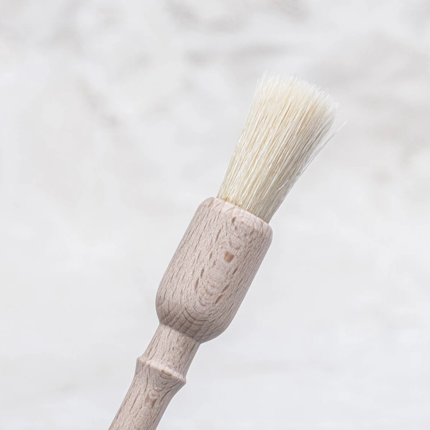 Close up of Fathom Large Pastry Brushes, German-made natural bristles, 19cm round pastry brush, ideal for baking and basting.