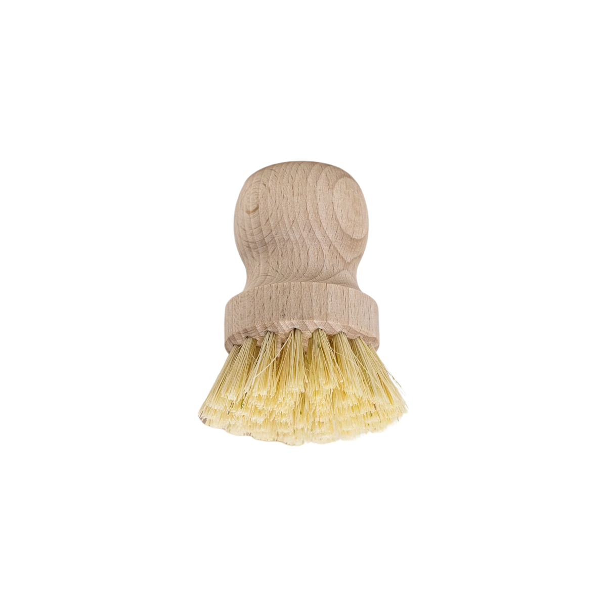 Upside down view of Fathom Pot Brush Tampico Fibre- Raw beechwood brushes with stiff bristles rest on textured fabric.