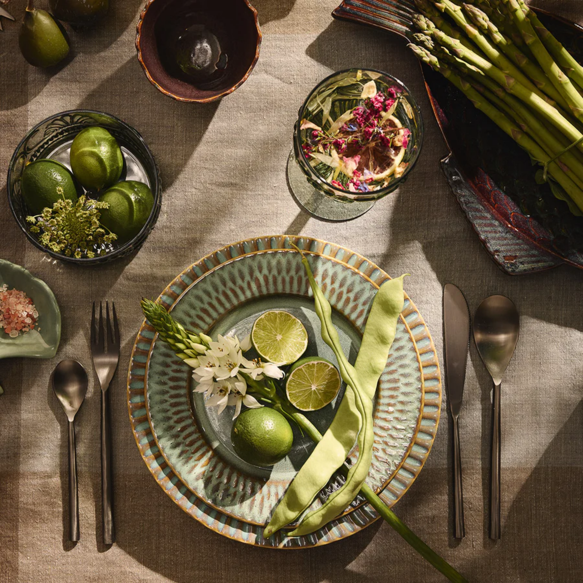 Shown laid on a dining table Fathom Tablecloth, moss- Rectangular Linen Cotton Blend - Multicolour Check Plaid - Linen & Cotton - Hemmed edge with refined finish