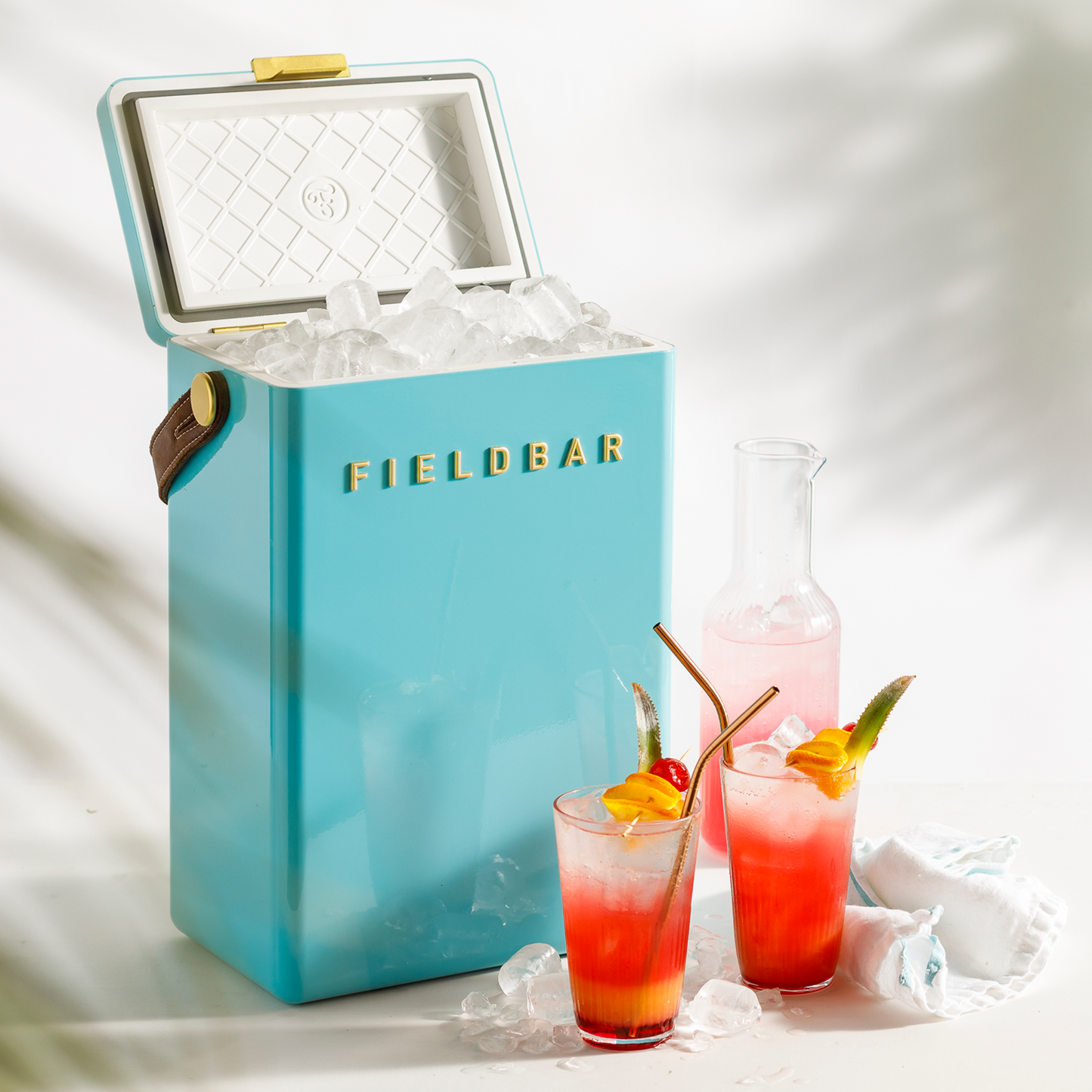 Side view of FIELDBAR Drinks Box MK II hardcase cooler, Bazaruto blue, 10L capacity, durable and comfortable to carry.