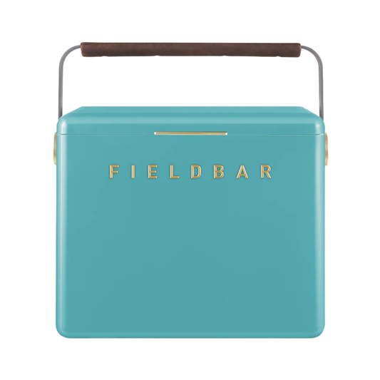 Front view of FIELDBAR Gin Trunk Bazaruto Blue - premium hardcase 24L cooler box in impact-resistant material with leather-wrapped handle, extruded aluminum carry handle, reflective heat-reducing finish, airtight gasket, BPA-free insulated interior, and 50-hour ice performance.