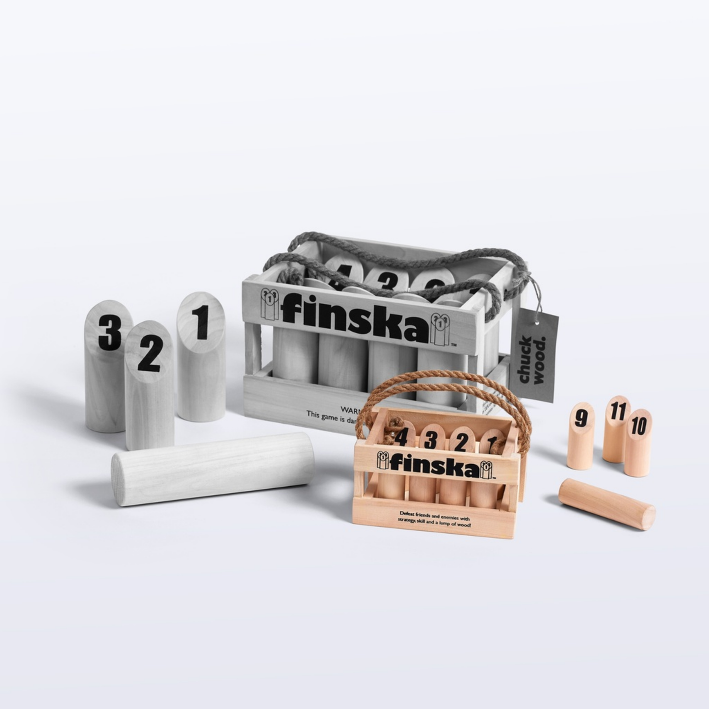 Showing two sizes emphasizing Finska Mini natural birch compact indoor throwing game set, includes 12 numbered mini pins, mini throwing log, birch carry crate, rule card, and score sheet. Smaller version of the Original Finska, perfect for indoor fun or limited spaces.