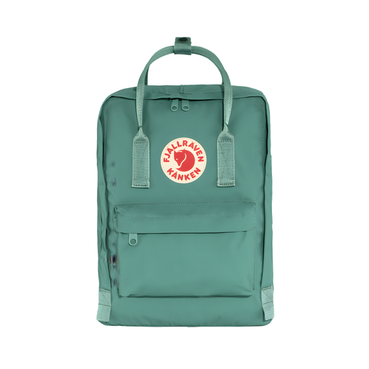 Front view of The Fjallraven Kanken Frost Green Backpack which is made from hard-wearing Vinylon F fabric and features a spacious main compartment with a full-length zip, removable PE foam seat cushion, two flat side pockets, a zipped front pocket, adjustable shoulder straps, and top handles. Durable and practical backpack for everyday use.