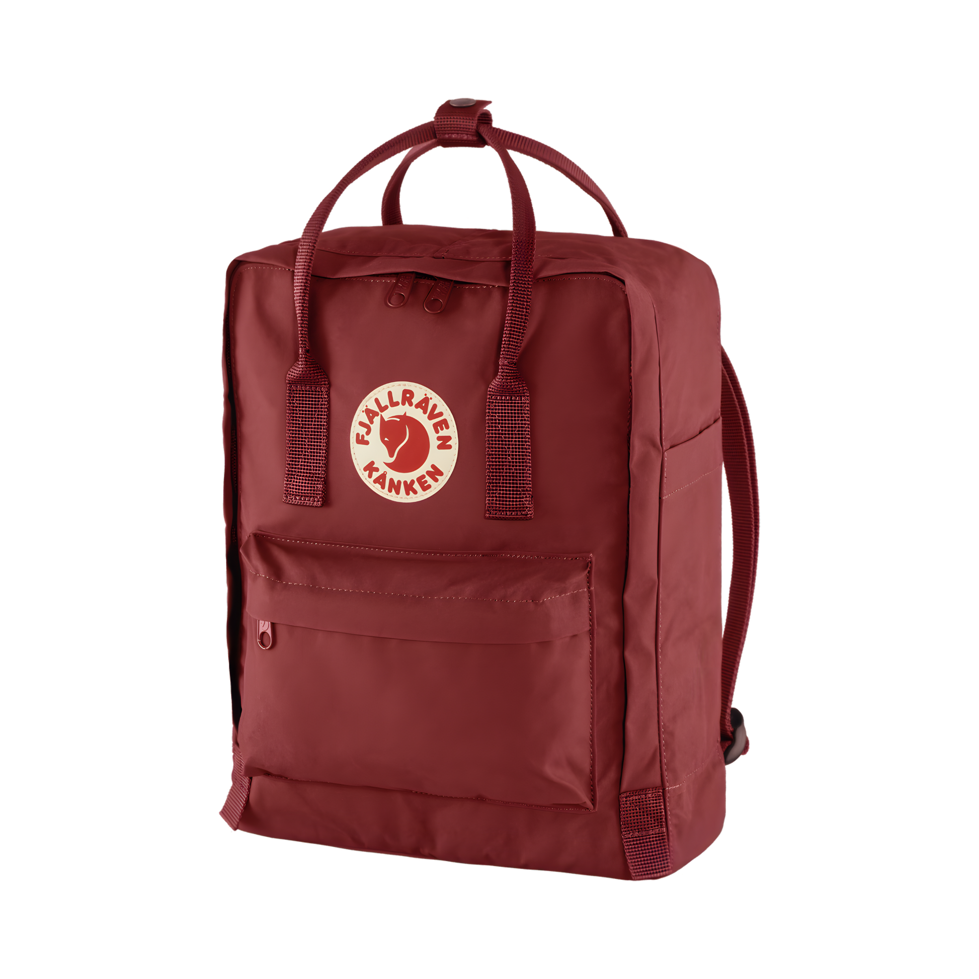 Semi front view of The Fjallraven Kanken Ox Red Backpack made from hard-wearing Vinylon F fabric and features a spacious main compartment with a full-length zip, removable PE foam seat cushion, two flat side pockets, a zipped front pocket, adjustable shoulder straps, and top handles. Designed for school, work, trekking, and travel, it includes a reflective logo and an internal address label, making it a durable and practical backpack for everyday use.