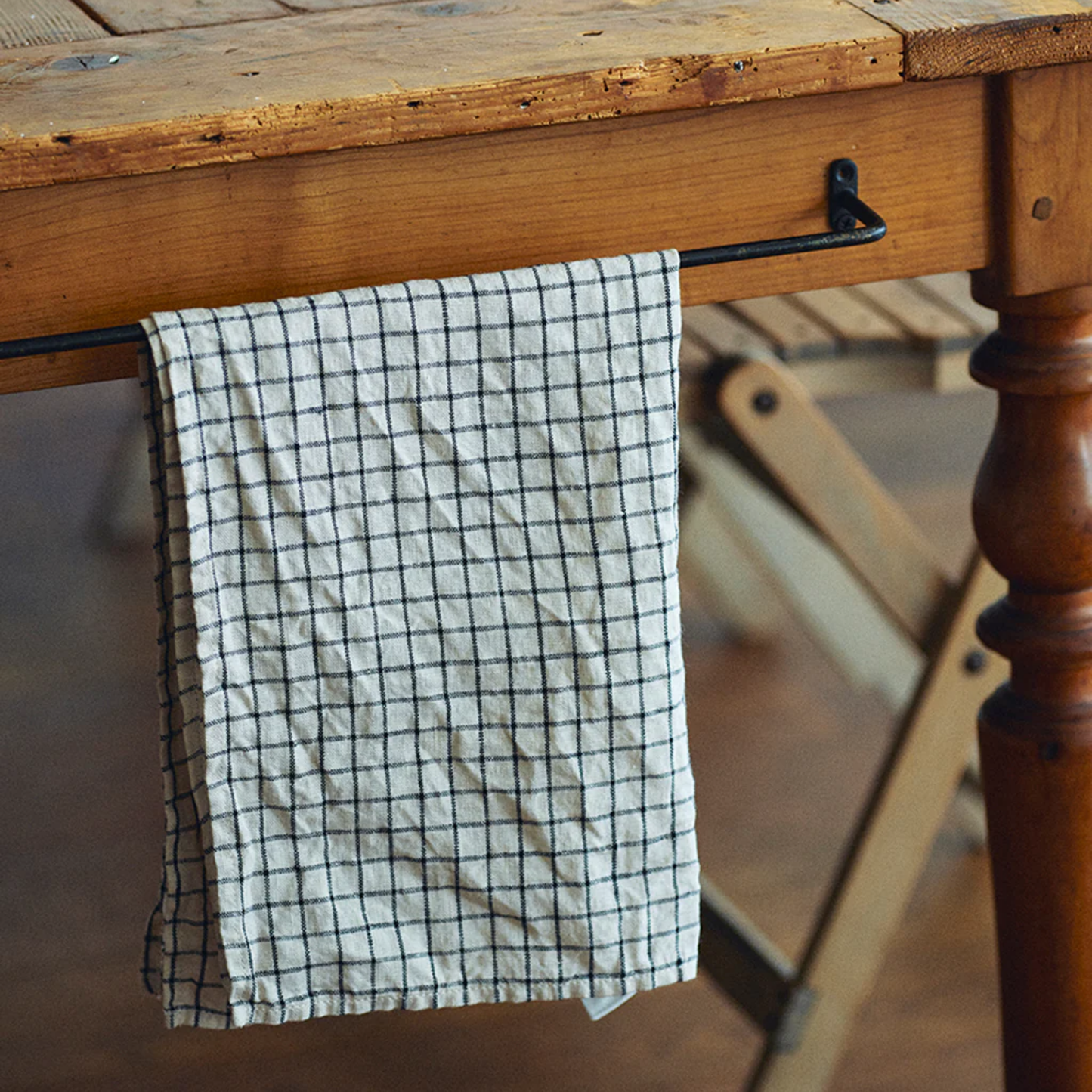Fog Linen cloth tea towel jenn hanging on wooden kitchen countertop