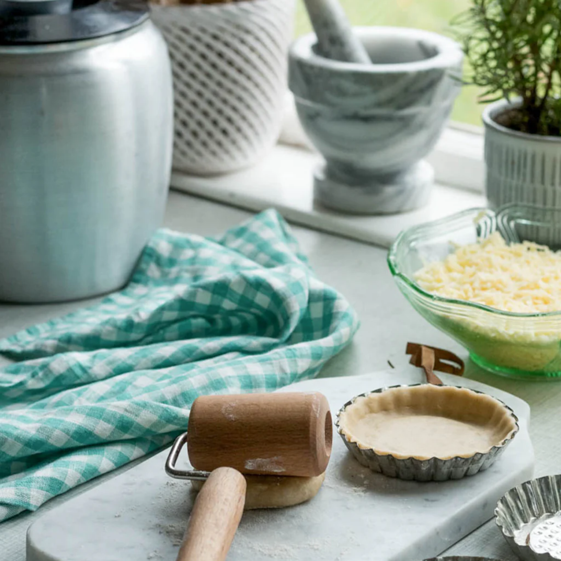 Fog Linen cloth tea towel jules on marble countertop with baking equipment 