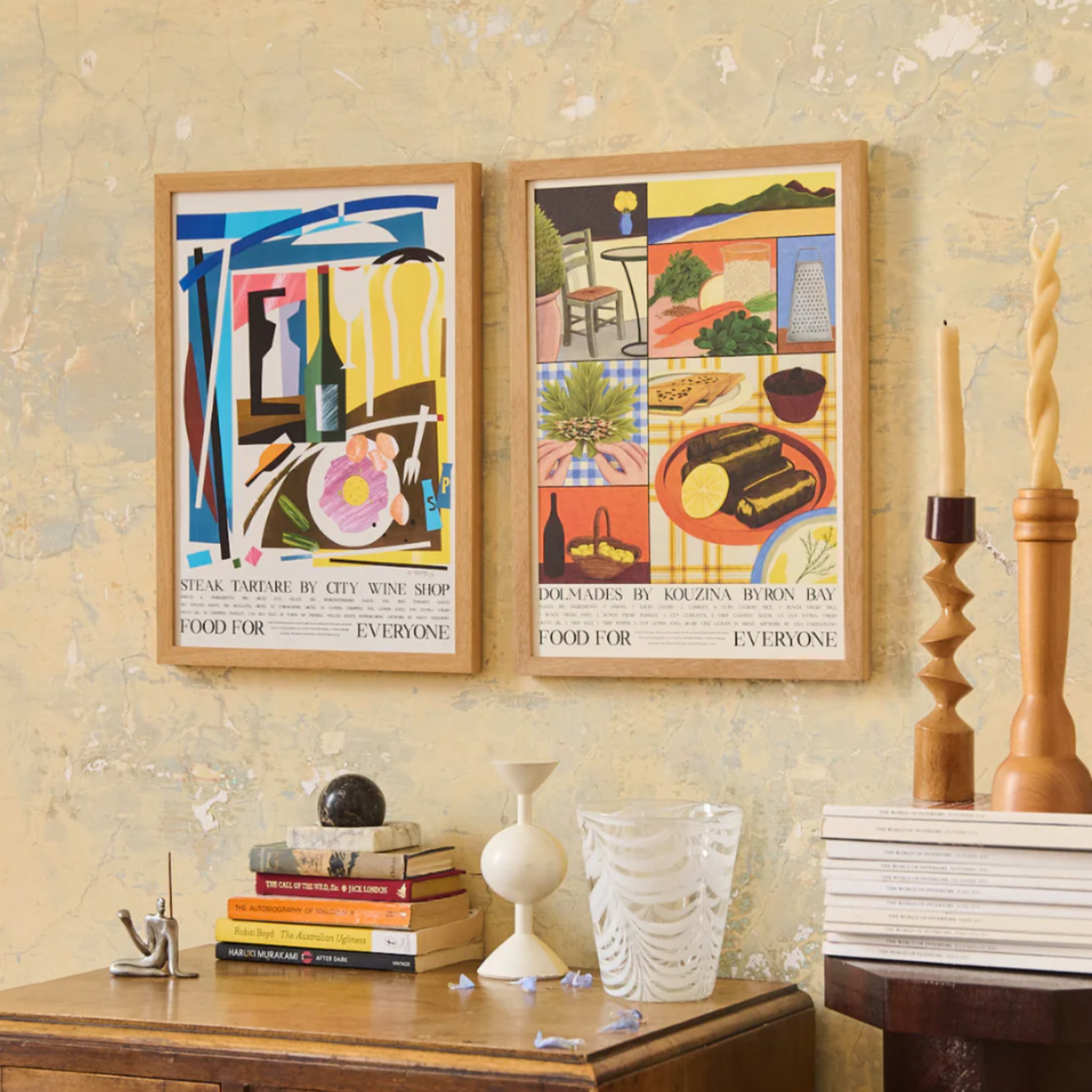 Artworks hanging in Food For Everyone A2 frame abover cabinet
