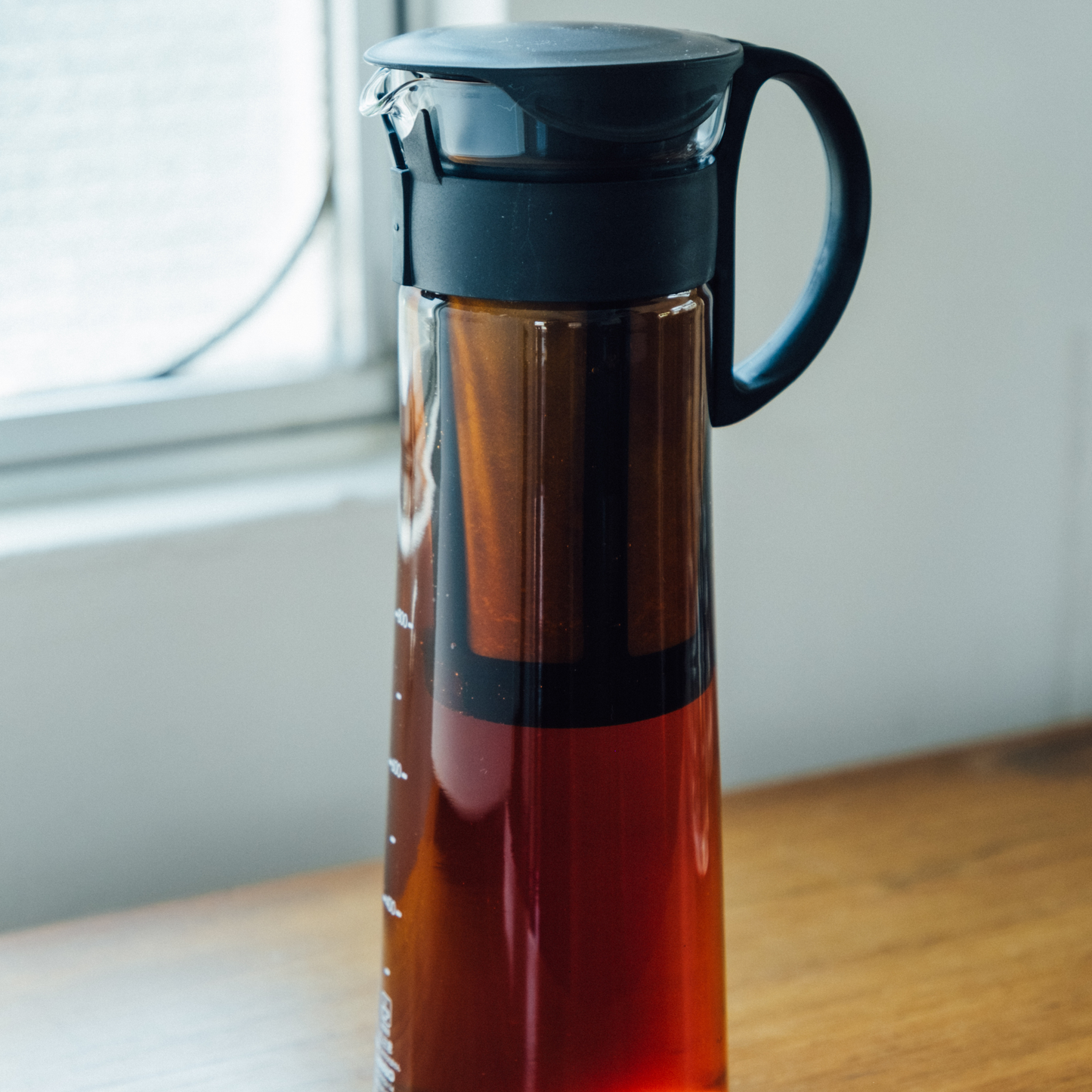 Coffee brewed inside the Hario Cold Brew Coffee Pot Glass Black that is made from durable heatproof Hario glass, foolproof design with 1L capacity.