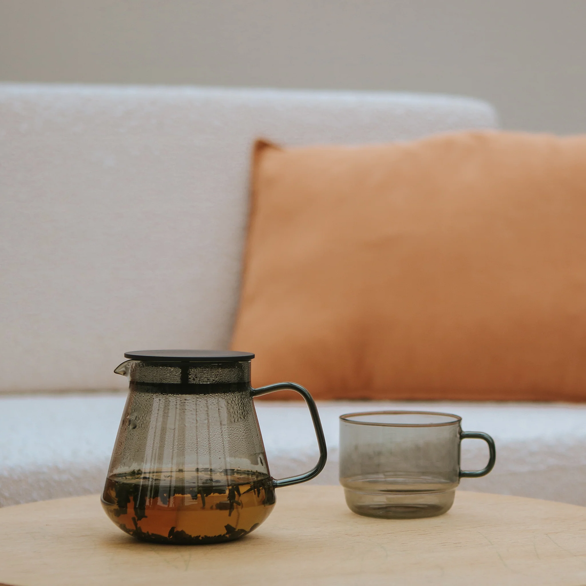 The Hario Glass Stacking Mug Grey on the table with a glass server, it is made from heatproof glass, for 300ml capacity.