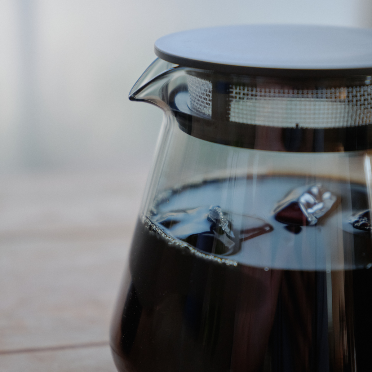 Close up of the Hario Glass Tea Server Grey which is made from heatproof glass, can also be used to contain the dripped coffee.