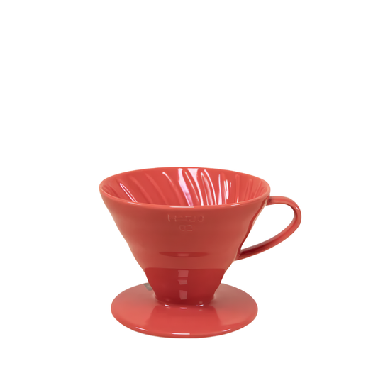 HARIO V60 ceramic coffee dripper red porcelain with spiral ridges and conical shape for adjustable brewing flow, includes polypropylene measuring spoon.