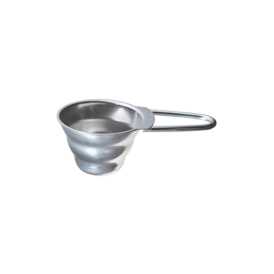 Semi top view of the Hario V60 Measuring Spoon made from stainless steel designed to complement the v60 series, perfect gift for the barista, with 12g ground coffee capacity, made in Japan.