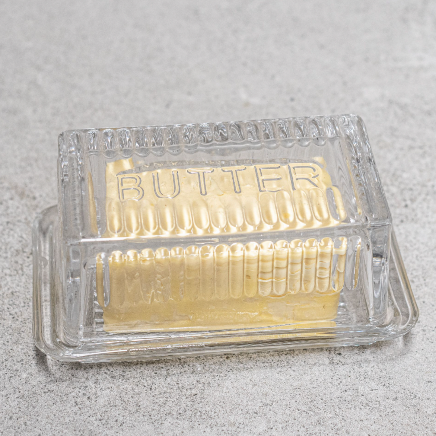 Heaven in Earth Glass Butter Dish with butter inside and lid on