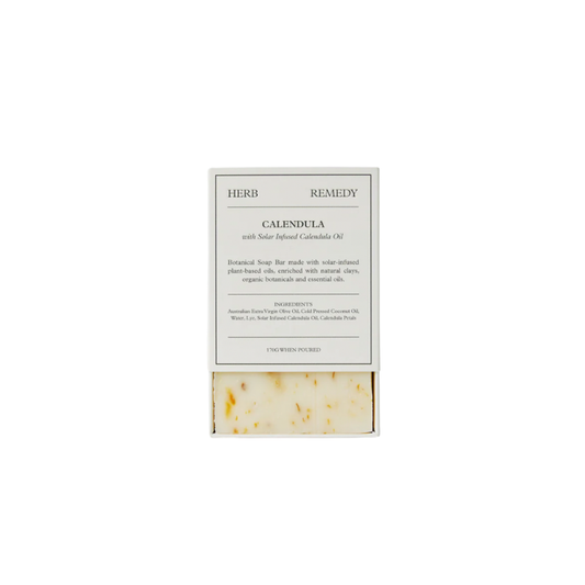 Herb Remedy botanical soap bar Calendula front view half open showing soap