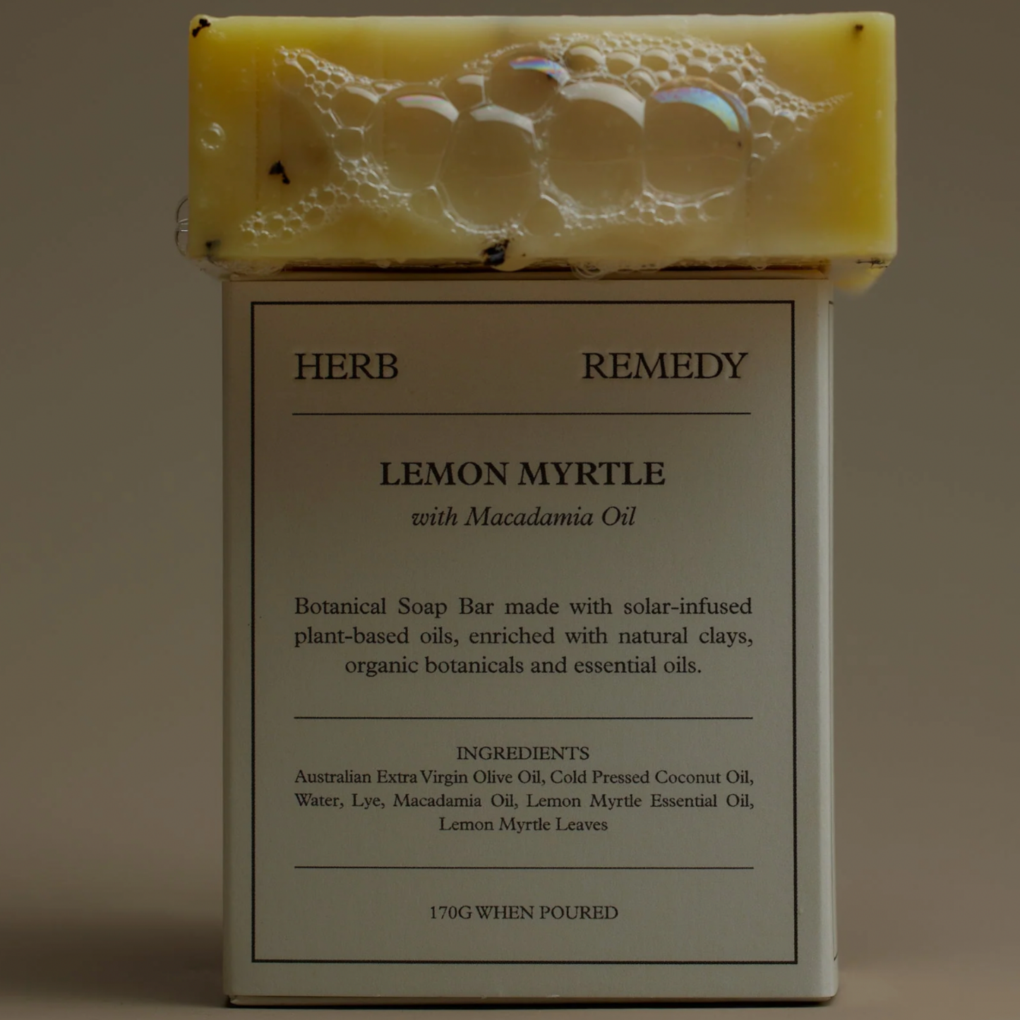 Herb Remedy Lemon Myrtle soap bar on top of packaging box