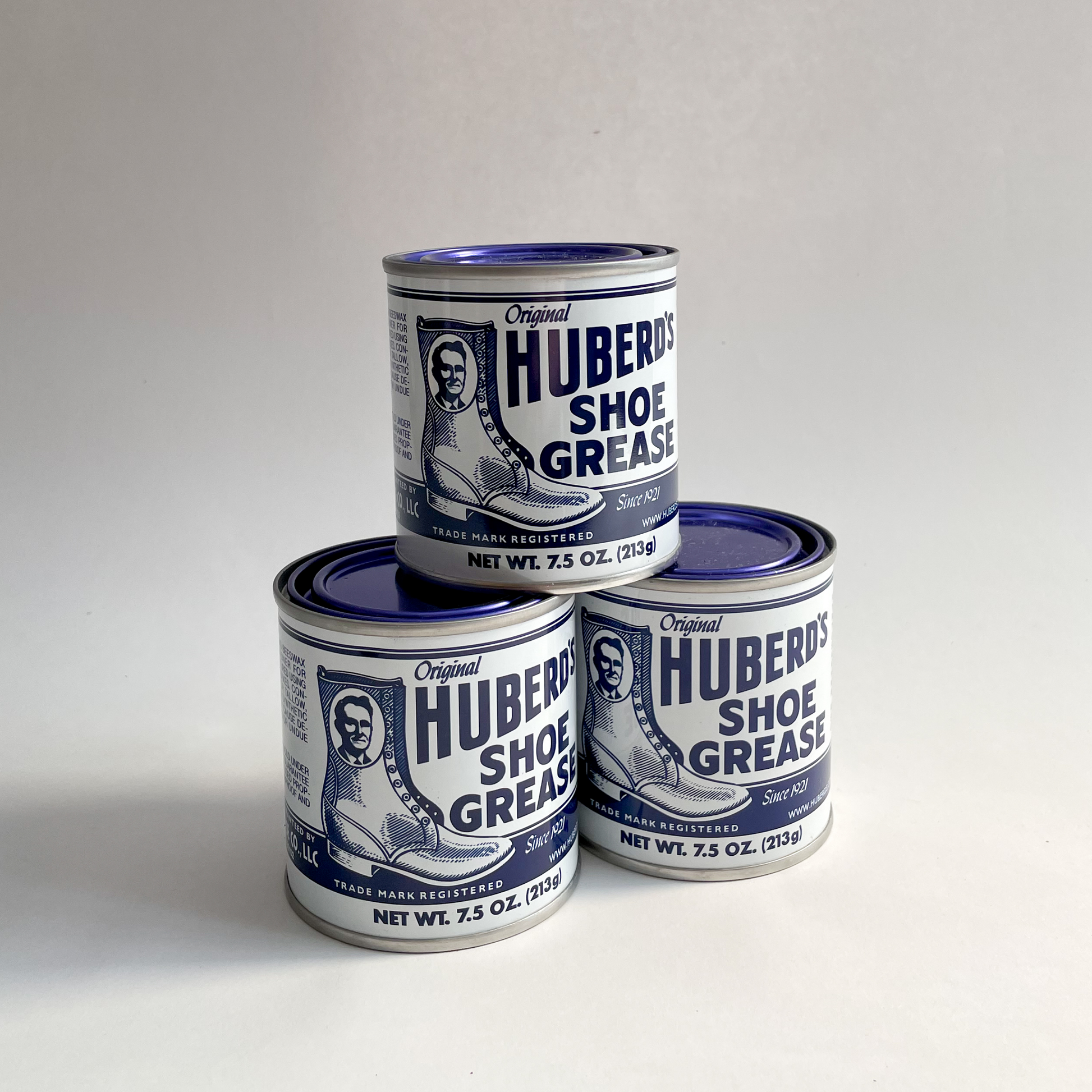 Huberds shoe greese back of can with labekl showing front on view