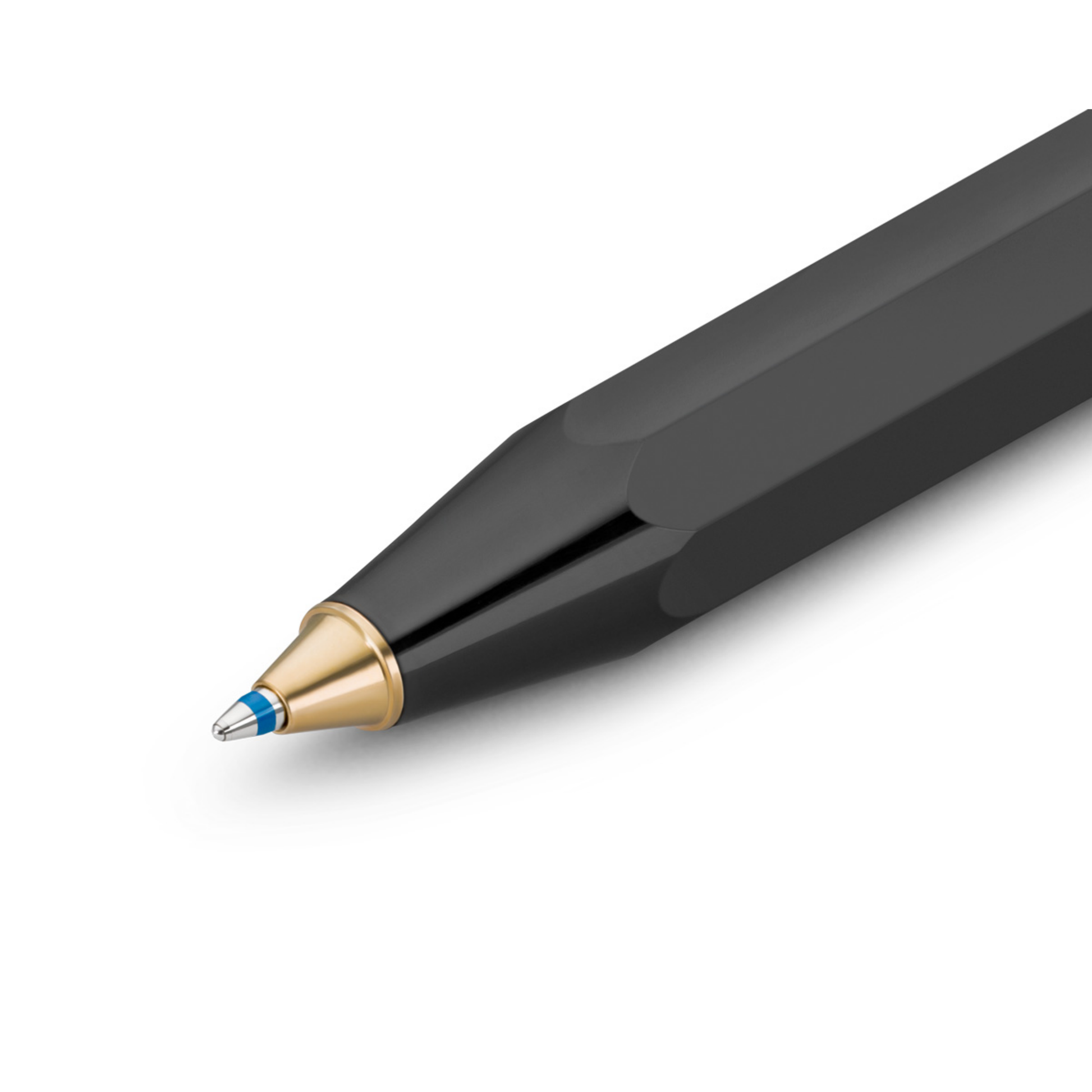 Upclose view of the tip of the pen with the blue ink marking of Kaweco Classic Black Pocket Ballpoint Pen - 10.5 cm lightweight plastic pen in timeless black with blue D1 refill; compact vintage-inspired design pairs with matching clips for elegant everyday writing.