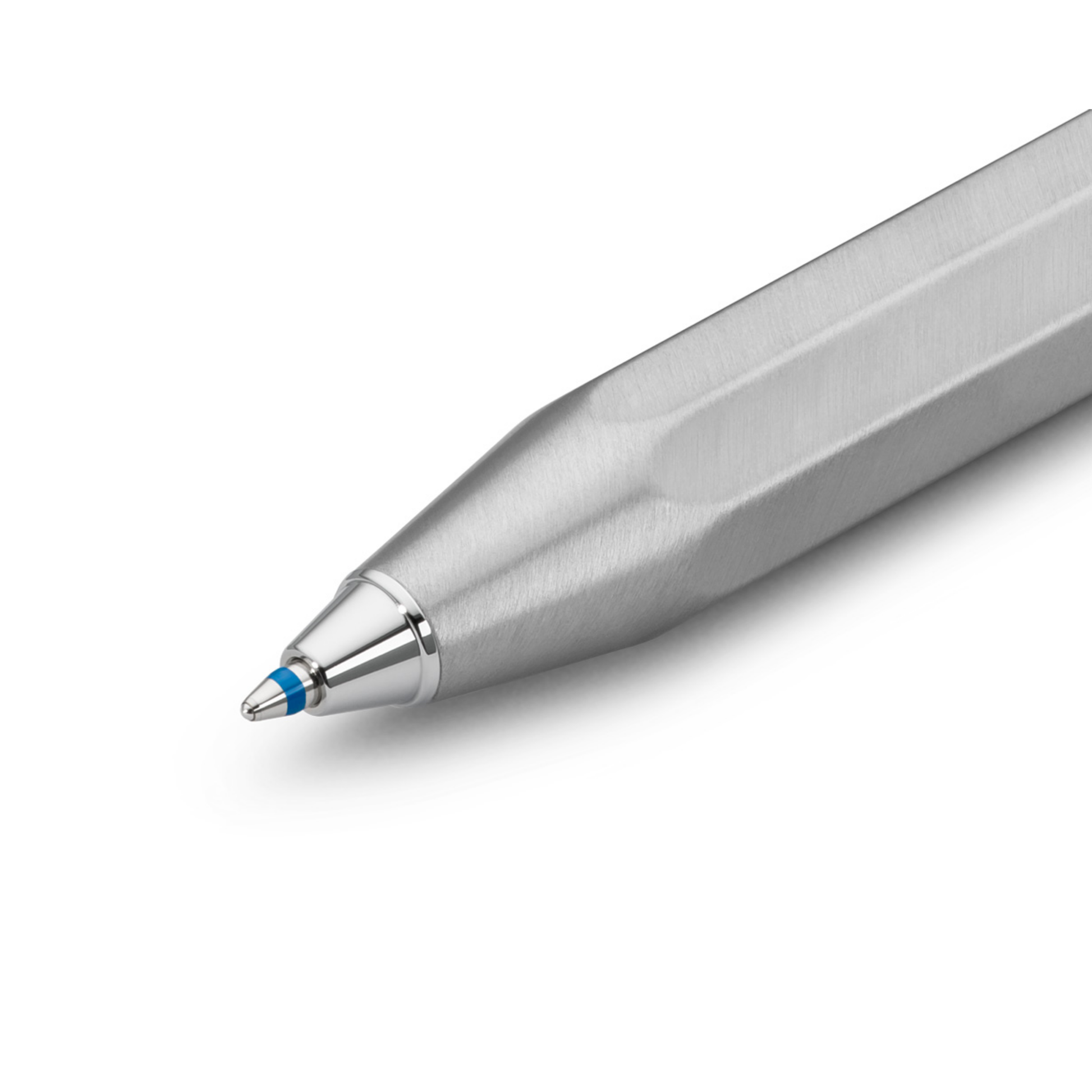 Showing upclose the tip of the pen with the blue ink mark of Kaweco Stainless Steel Pocket Ballpoint Pen - 10.5 cm brushed silver pen with heart-curve mechanism for smooth, silent precision writing; includes blue D1 refill and durable stainless steel body for a refined, professional look.