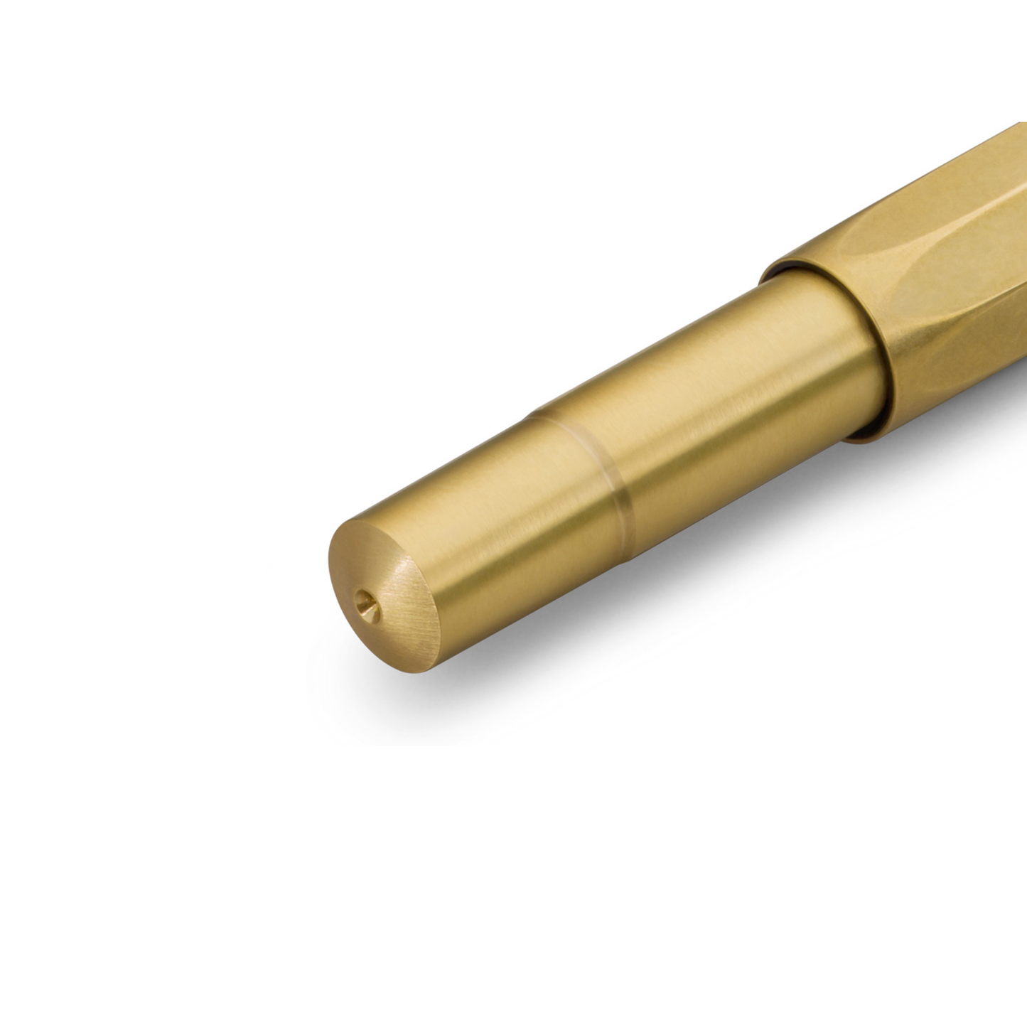 Close up of the unrolled tip of Kaweco Brass Sport Rollerball Pen - compact 10.5 cm brown brass pen with 0.7 mm black G2 refill, silver logo cap, and smooth ceramic roller for effortless writing; ages beautifully with a natural patina.