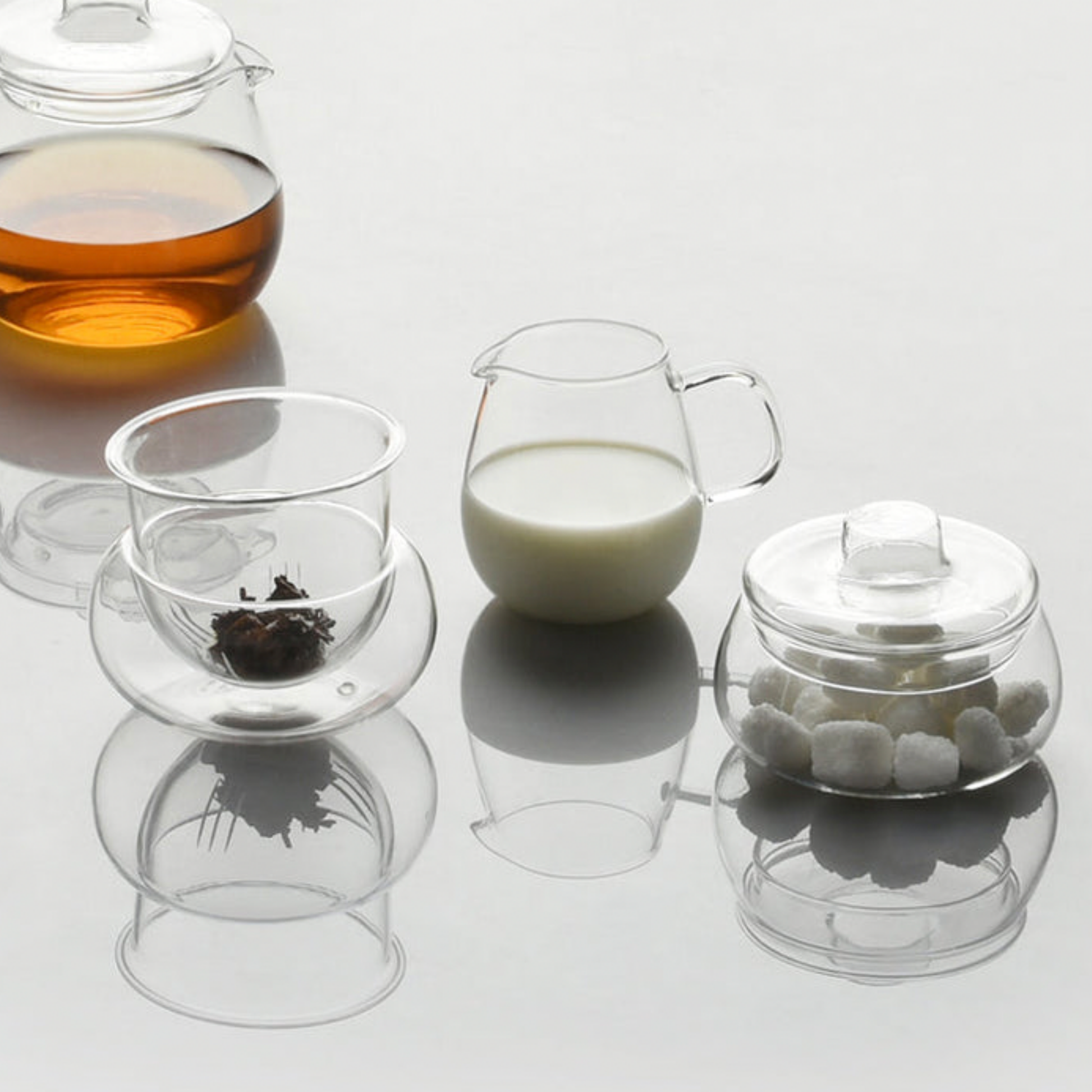 Stylish glass Unitea Sugar Pot styled with Kinto glassware with sugar cubes inside pot