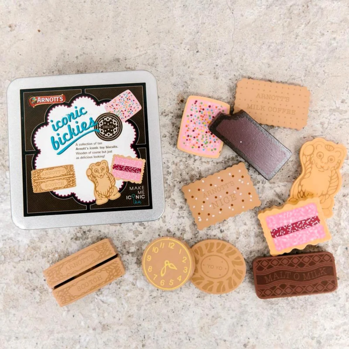 Showing the wooden biscuits of Make Me Iconic wooden Australian biscuit toy set featuring 10 classic Arnott's-style biscuits with numbers on the back, handcrafted from non-toxic wood and stored in a decorative tin - perfect for pretend tea parties and playful learning with Aussie charm.