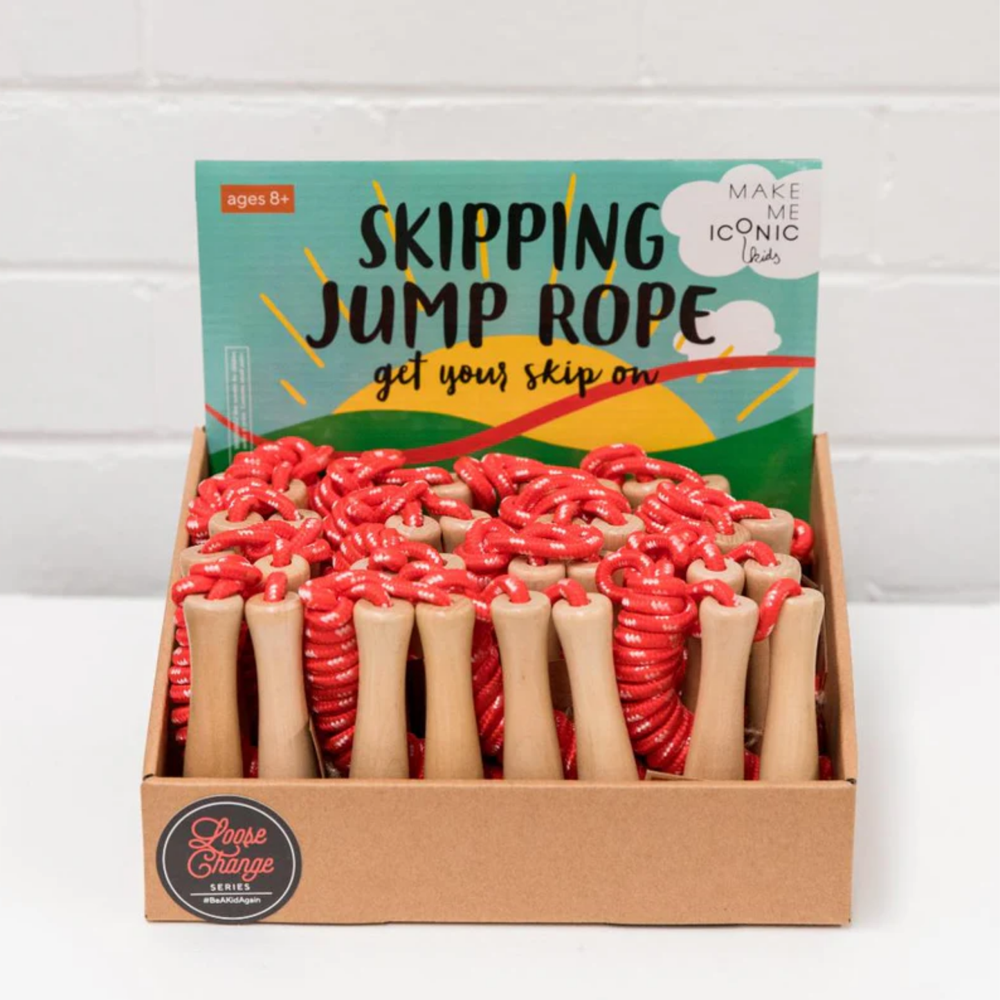 In a tray a group of Make Me Iconic wooden skipping rope - classic natural wood handles with sturdy neutral rope, designed for kids to build rhythm, balance, and coordination through active, screen-free play