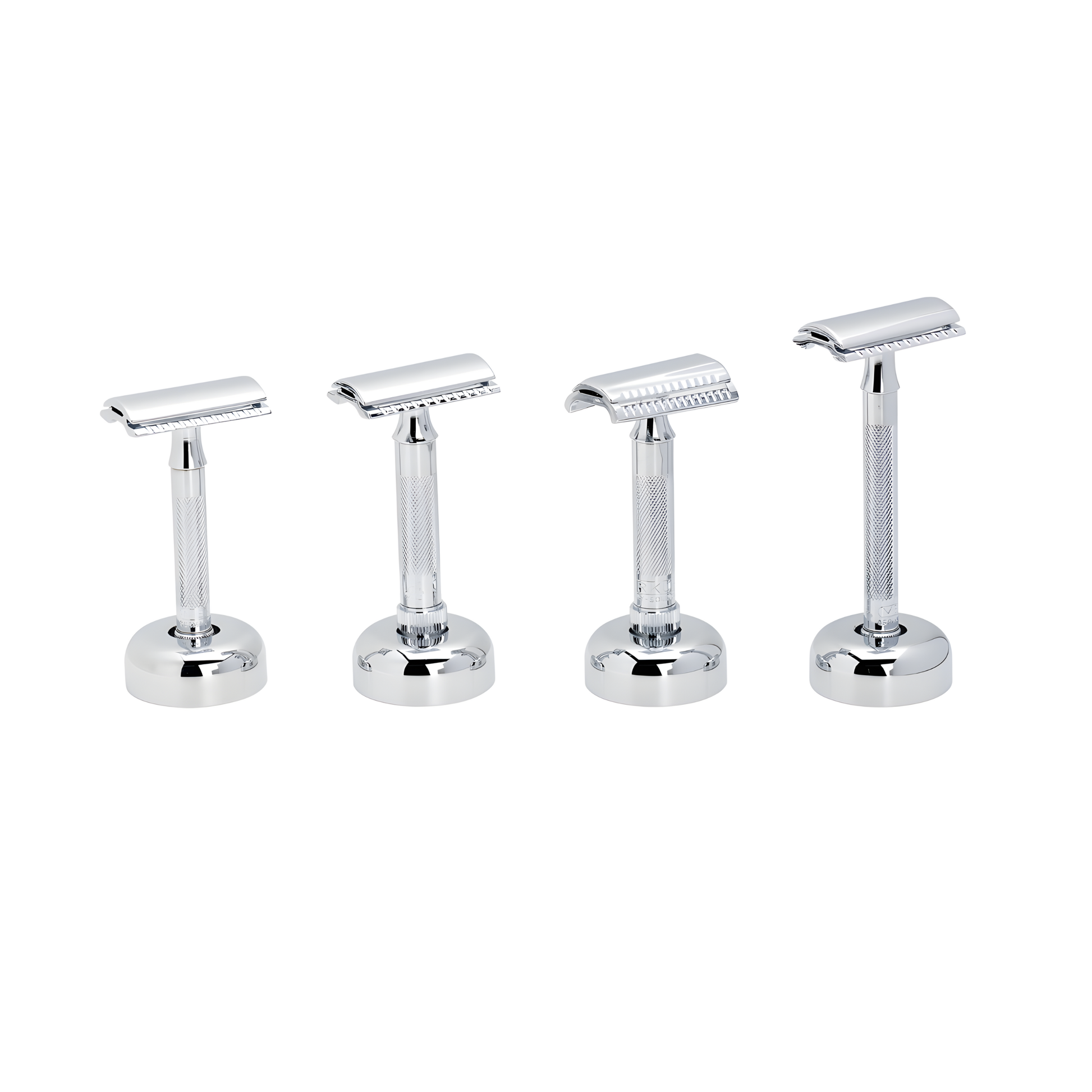 Another photo of Fathom chrome razor stand in use with different razor sizes. Stand is a bright chrome finish, weighted base, and rubber ring for grip, fits most MERKUR razors, stylish bathroom countertop or sink accessory.