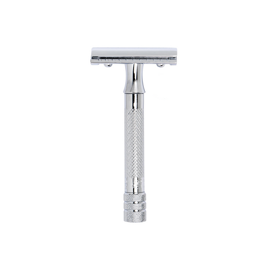 Front view of the standing Fathom 33C safety razor in chrome with brass handle, zinc die-cast head, closed comb design for classic wet shaving, corrosion-resistant, high-quality precision shaving tool.