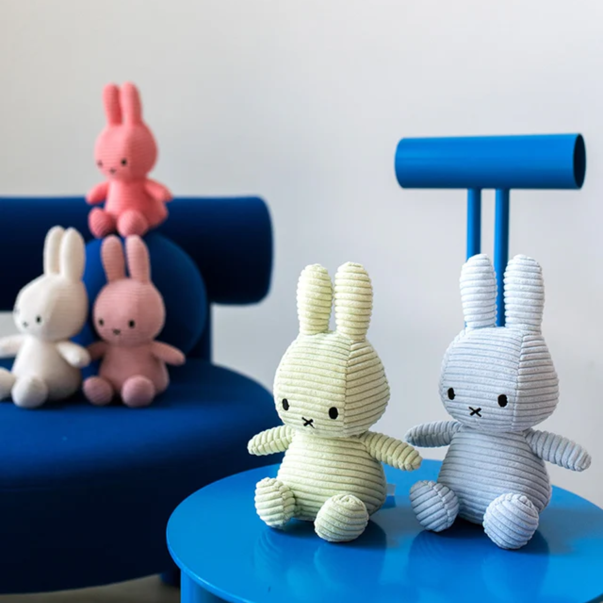 Shown with other colors Miffy Corduroy plush toy, handmade from soft corduroy fabric with 100% recycled PET filling, ethically produced and available in various colors - a timeless and eco-friendly gift for babies or interior décor.