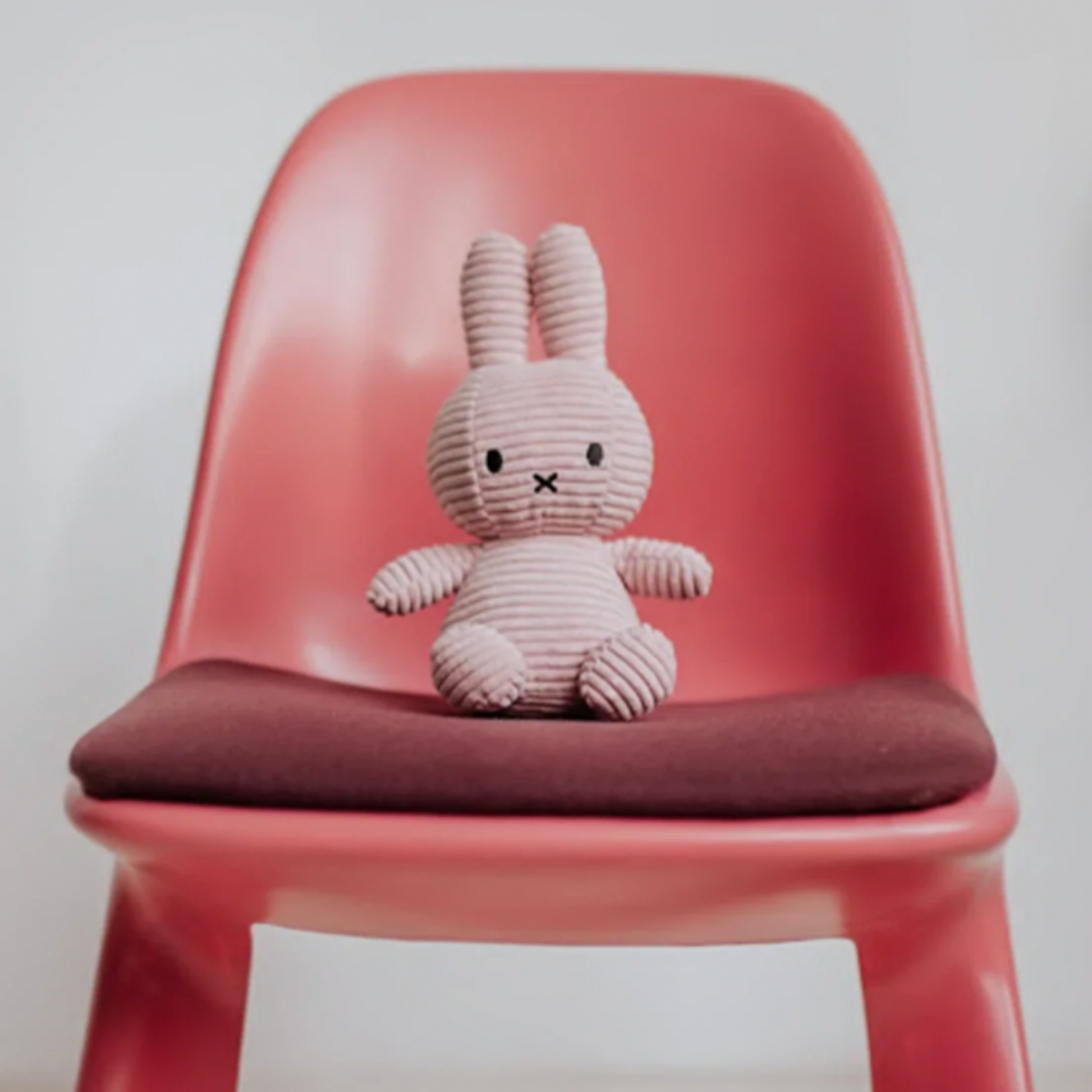 Sitting Miffy 23cm pink corduroy sitting on pink chair