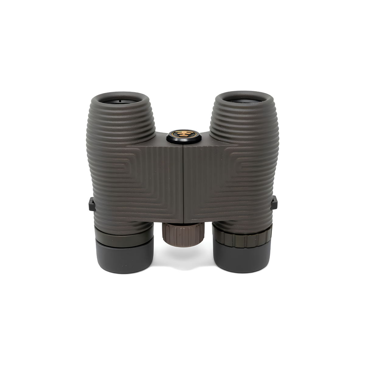 Nocs Provisions Binocular Standard Issue 8X25 Charcoal black that has multi-coated lenses and premium BaK4 prisms, waterproof, fogproof and compact, showing the eyepieces down on the surface.